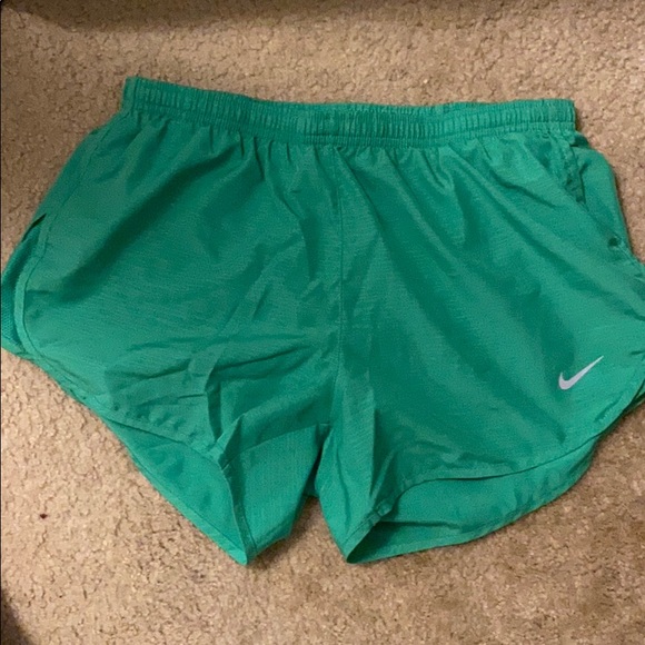 green nike running shorts